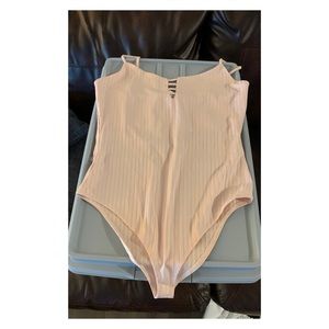 Socialite bodysuit (in peach) Tilly’s
